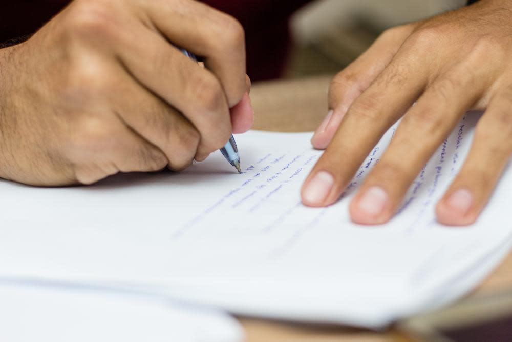 Essay writing services must be banned to stop cheating, say academics (Getty)