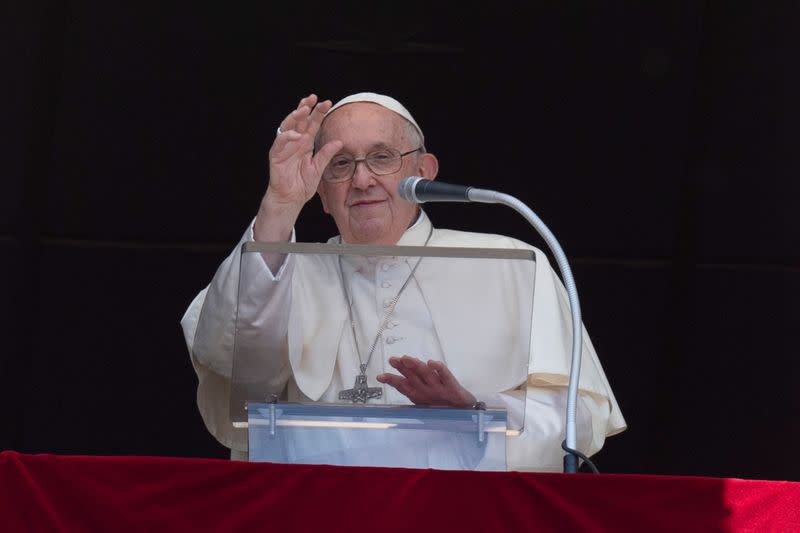 Pope Francis leads the Angelus prayer from his window at the Vatican