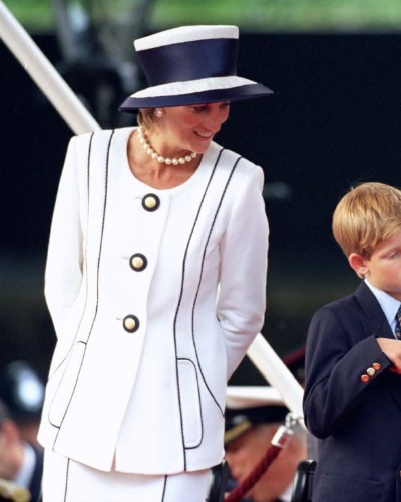 Her monochrome 50th VJ day celebration attire