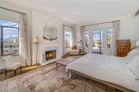 <p>Additionally, the property includes three bathrooms and a powder room.</p>