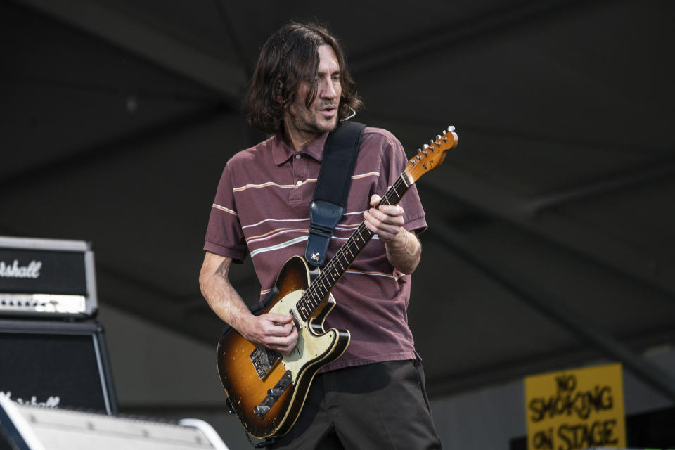 John Frusciante of the Red Hot Chili Peppers performs at the New Orleans Jazz and Heritage Festival, on Sunday, May 1, 2022, in New Orleans. (Photo by Amy Harris/Invision/AP)