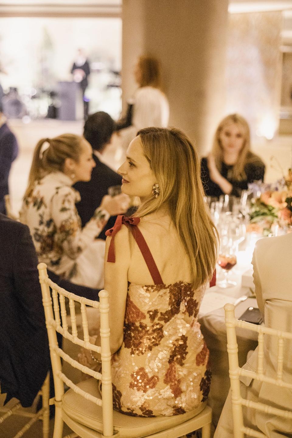 The bride combined California cool with English tradition, wore two Carolina Herrera dresses, and drove off in a vintage Porsche.