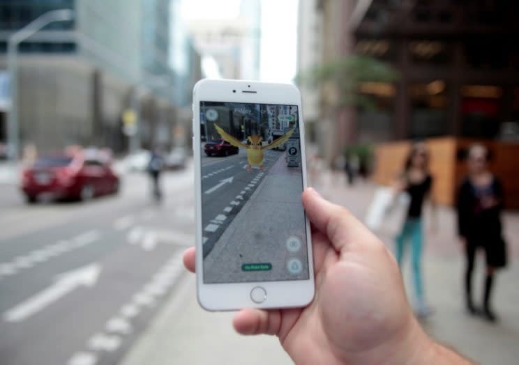 A Pidgey is displayed on the screen of the "Pokémon Go" mobile app. (Photo: Chris Helgren/Reuters)