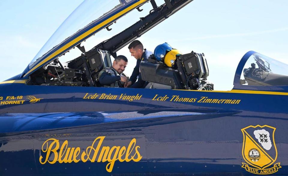 Erik Erazo, left, was preped for his flight by AD2 Cameron Tuzon with the U.S. Navy Blue Angels. Tammy Ljungblad/tljungblad@kcstar.com