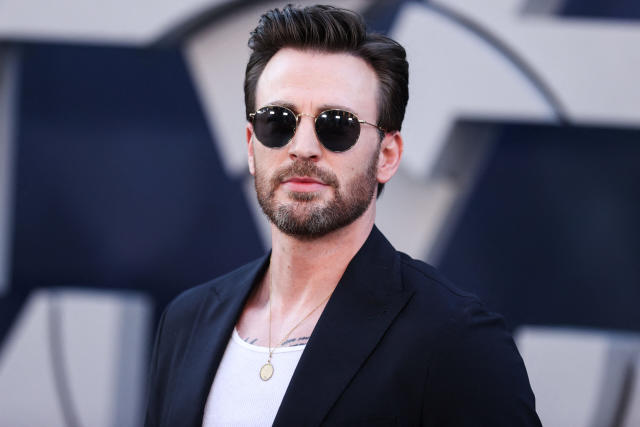 Chris Evans Flaunts Wedding Ring in First Public Confirmation of Marriage, Albany Herald Parade Partner Content