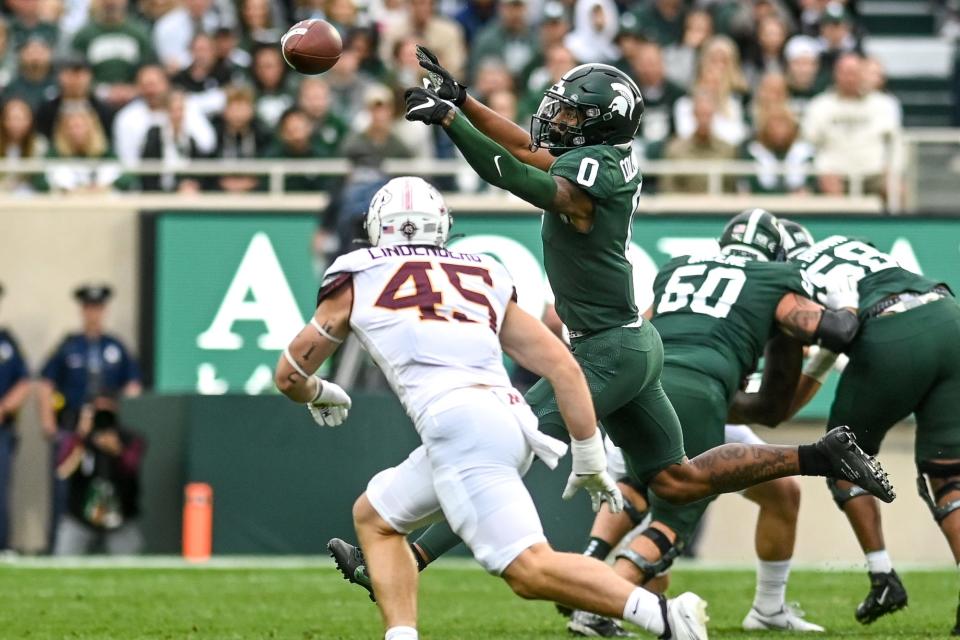 Michigan State's Keon Coleman, right, can't pull in a pass against Minnesota during the second quarter on Saturday, Sept. 24, 2022, at Spartan Stadium in East Lansing.