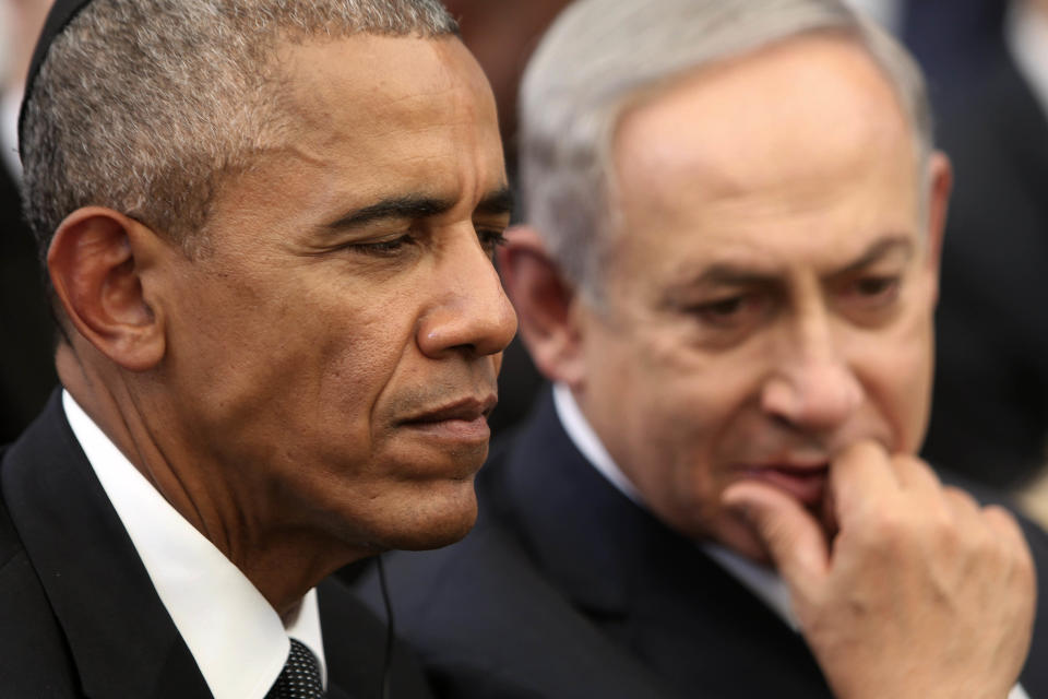 FILE -- In this Sept. 30, 2016 file photo, US President Barack Obama, left, and Israeli Prime Minister Benjamin Netanyahu talk during the funeral of former Israeli President and Prime minister Shimon Peres in Jerusalem. Doubling down on its public break with the Obama administration, a furious Israeli government says it has "ironclad" information from Arab sources that Washington actively helped craft last week's U.N. resolution declaring Israeli settlements illegal. The allegations further poison the increasingly toxic atmosphere between Israel and the outgoing Obama administration in the wake of Friday's vote, and raise questions about whether the White House might take further action. (Menahem Kahana, Pool via AP, File)