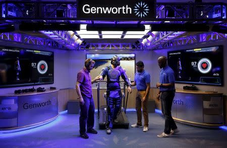 Ugo Dumont, a volunteer for the Genworth R70i Aging Experience, participates in a demonstration at the Liberty Science Center in Jersey City, New Jersey, April 5, 2016. REUTERS/Shannon Stapleton