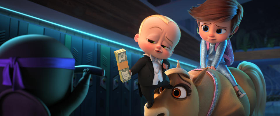 (from left) The Boss Baby/Ted Templeton (Alec Baldwin) and young Tim Templeton (James Marsden) in DreamWorks Animation's The Boss Baby: Family Business, directed by Tom McGrath.