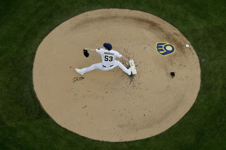 Milwaukee Brewers starting pitcher Brandon Woodruff throws during the first inning of the Game 2 of the baseball National League Divisional Series against the Atlanta Braves Saturday, Oct. 9, 2021, in Milwaukee. (AP Photo/Morry Gash)