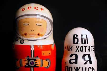 Matrioshka dolls depicting the story of a Russian cosmonaut Gherman Titov can be seen on display during an exhibition showcasing the story of the space race through Russian Matrioshka dolls at the Samara Space Museum in Samara, Russia, June 22, 2018. REUTERS/David Gray