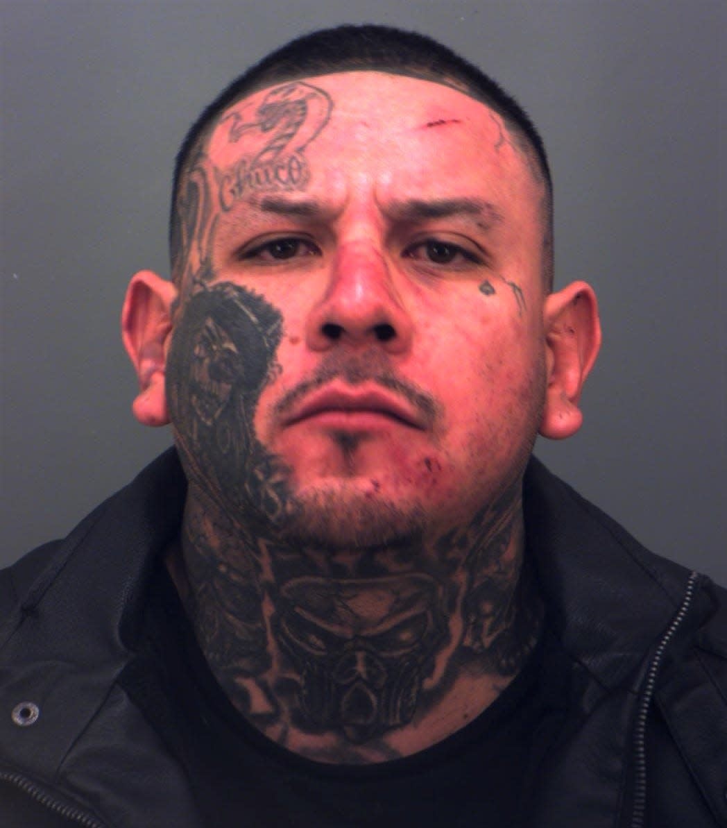 Julio Cesar Perez, 33, was arrested on two outstanding warrants for probation violation on an aggravated assault on a peace officer charge, authorities said.