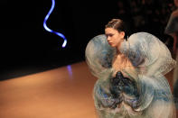 A model wears a creation for Iris van Herpen Haute Couture Spring/Summer 2020 fashion collection presented Monday Jan.20, 2020 in Paris (AP Photo/Michel Euler)