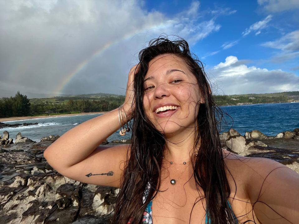 Ashley Probst selfie in front of rainbow