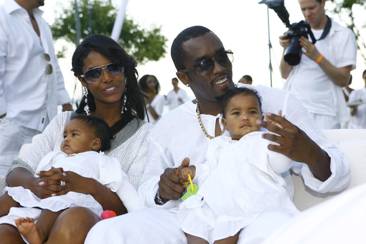 Sean ‘Diddy’ Combs and Kim Porter with their twin daughters, D’Lila Star Combs and Jessie James Combs, in 2007. (Mat Szwajkos/CP/Getty Images for CP)