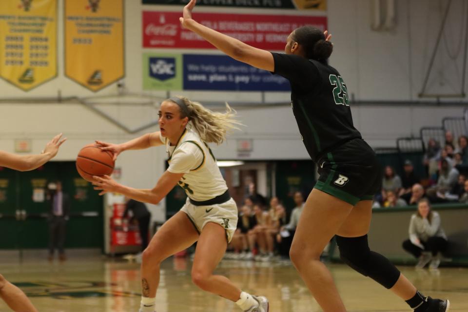 Emma Utterback looks to dish during the Catamounts' 63-56 win over Binghamton at Patrick Gym on Jan. 25, 2023.