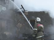 A firefighter works near a psychiatric hospital destroyed by fire in the Novgorod region town of Luka in this September 13, 2013 handout provided by the Russian Emergencies Ministry. The fire raged through the Russian psychiatric hospital on Friday, killing at least one person and leaving dozens missing as police searched the surrounding area for survivors, emergency and law enforcement officials said. Picture taken with a video camera. (REUTERS/Russian Emergencies Ministry of Novgorod region/Handout via Reuters)