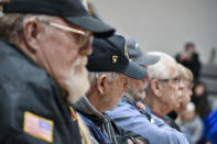 Military veterans are seen at a Veterans Day event at Bigfork High School, Nov. 10, 2023, in Bigfork, Mont. Voters in the state will decide next year if Sen. Jon Tester gets a fourth term as he's expected to face strong Republican opposition. (AP Photo/Matthew Brown)