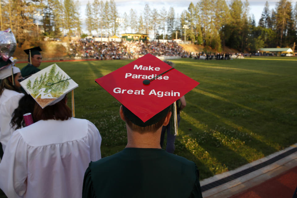 Ryan Chandler wear a simple message on his graduation cap to the graduation ceremonies at Paradise High School in Paradise, Calif., Thursday June 6, 2019. Most of the students of Paradise High lost their homes when the Camp Fire swept through the area and the school was forced to hold classes in Chico. The seniors gathered one more time at Paradise High for graduation ceremonies. (AP Photo/Rich Pedroncelli)