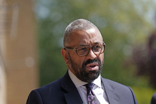 James Cleverly speaks to the media