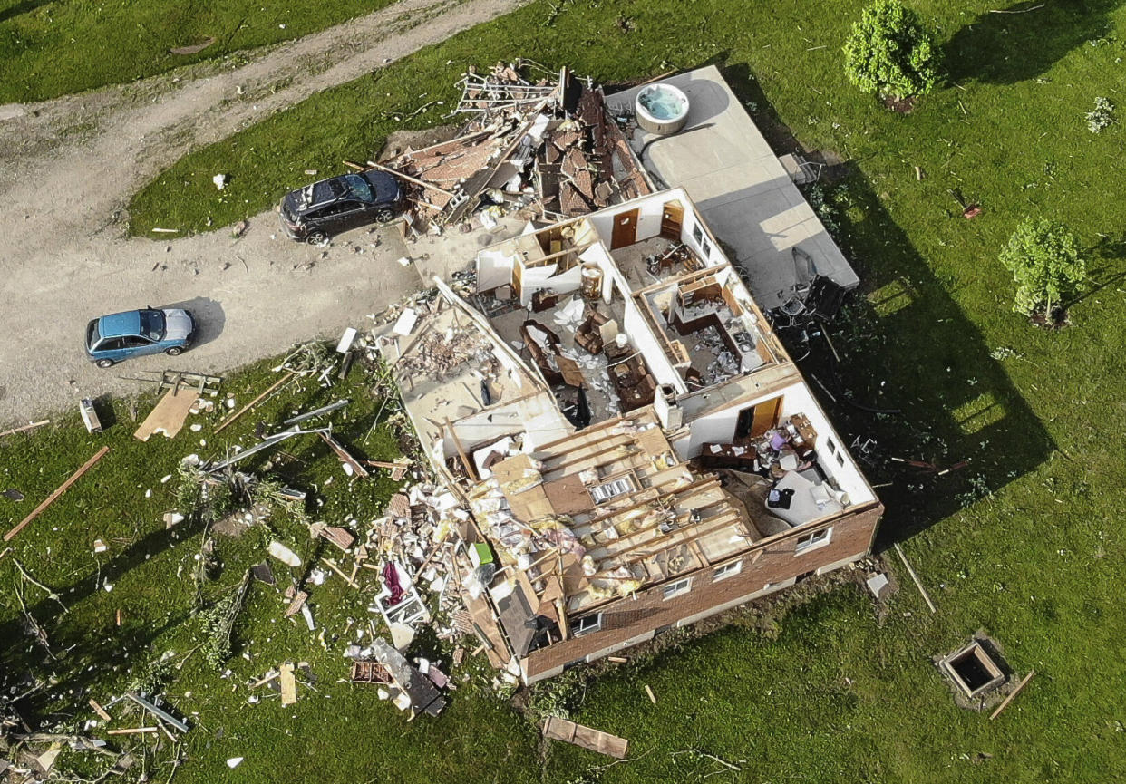 Storm-damaged homes in Brookville, Ohio, on May 28. (Photo: John Minchillo/AP)