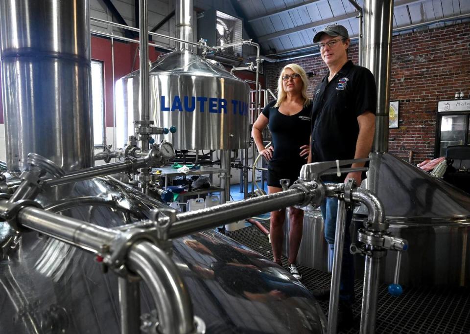 Desiree Chubb, director of quality and production at Motorworks Brewing in Bradenton, with Bob Haa, head brewer, have brewed a new beer using Florida hops. Tiffany Tompkins/ttompkins@bradenton.com