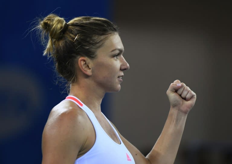 Simona Halep celebrates winning her quarter-final against Madison Keys at the Wuhan Open in China on September 29, 2016