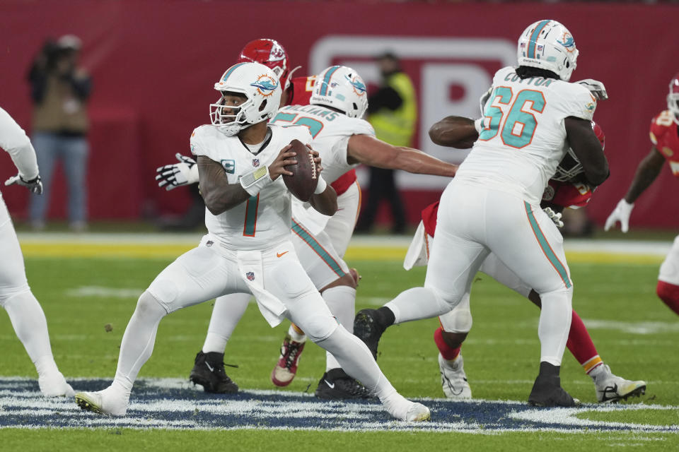 Miami Dolphins quarterback Tua Tagovailoa (1) looks to pass during the first half of an NFL football game against the Kansas City Chiefs Sunday, Nov. 5, 2023, in Frankfurt, Germany. (AP Photo/Michael Probst)
