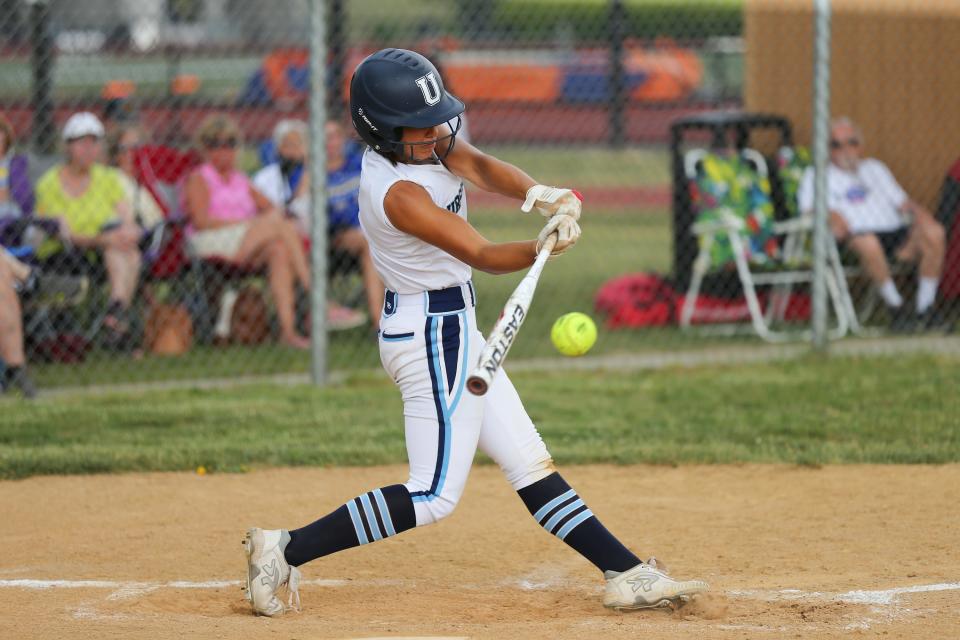 Jessica Tejera from Ursuline makes contact for a hit in the NY State Regional softball game, June 3, 2023.