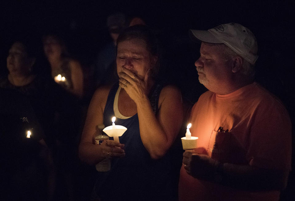 <p>Mourners participate in a candlelight vigil for the victims of a fatal shooting at the First Baptist Church of Sutherland Springs, Nov. 5, 2017, in Sutherland Springs, Texas. (Darren Abate/AP) </p>