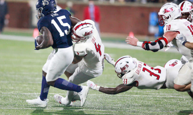 Riley Cole makes the tackle for South Alabama.