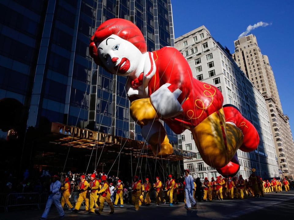 The Ronald McDonald balloon flies in the parade (AP)