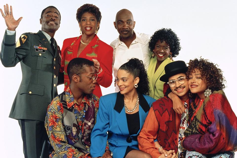 A DIFFERENT WORLD -- Pictured: (back row, l-r) Glynn Turman as Col. Bradford 'Brad' Taylor, Dawnn Lewis as Jaleesa Vinson Taylor, Lou Myers as Vernon GAines, Charnele Brown as Kimberly 'Kim' Reese (front row) Kadeem Hardison as Dwayne Cleophus Wayne, Jasmine Guy as Whitley Marion Gilbert Wayne, Darryl M. Bell as Ronald 'Ron' Johnson, Cree Summer as Winifred 'Freddie' Brooks