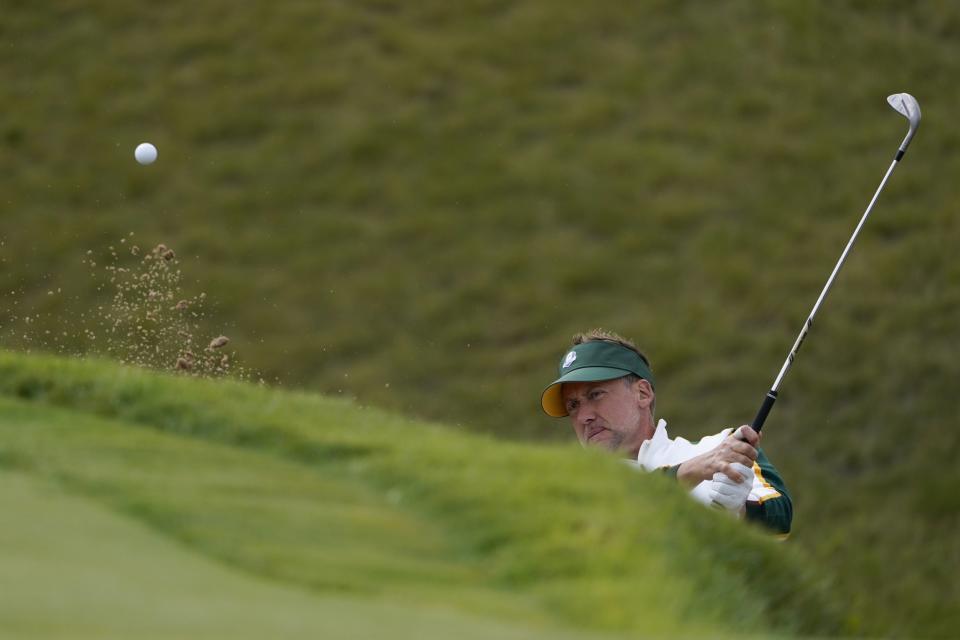 Team Europe's Ian Poulter hits from a bunker on the sixth hole during a practice day at the Ryder Cup at the Whistling Straits Golf Course Wednesday, Sept. 22, 2021, in Sheboygan, Wis. (AP Photo/Jeff Roberson)