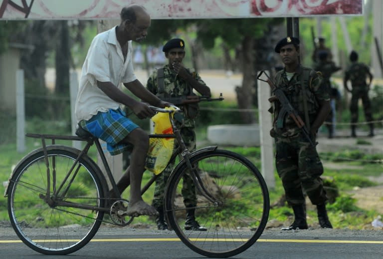 UN chief Ban urged Sri Lanka to reduce its army's presence in Tamil areas to help reconciliation