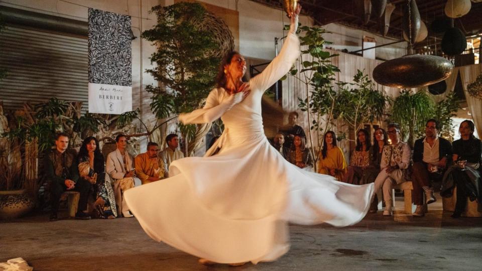 PHOTO: A sufi dancer highlights art based in Islamic mysticism at Muslim artist Aadil Abedi’s inaugural Chand Raat event, celebrating the eve of Eid. (Courtesy Stephanie Vu)