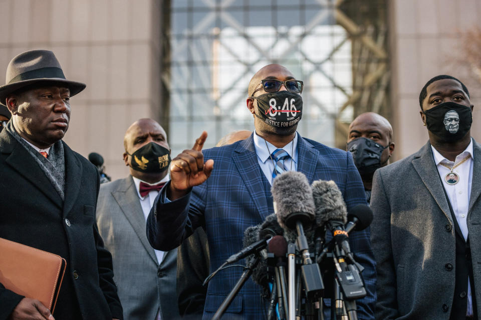 Image: Philonise Floyd, brother of George Floyd, speaks alongside attorney Ben Crump, left, and Brandon Williams, nephew of George Floyd, during a news conference outside the Hennepin County Government Center on March 29, 2021 in Minneapolis. (Brandon Bell / Getty Images)