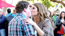 Apparently "Extra" correspondent <b>Maria Menounos</b> is a fan of this year's Go Daddy commercial -- or maybe she just likes sweet, nerdy star Jesse Heiman. She couldn't help but hug him when they were filming a segment for the entertainment news program at the Grove, a shopping center in Los Angeles. But it wasn't just her hands that she couldn't keep to herself; <a href="http://www.dailymail.co.uk/tvshowbiz/article-2279022/Maria-Menounos-recreates-infamous-Super-Bowl-kiss-geeky-programmer.html" rel="nofollow noopener" target="_blank" data-ylk="slk:they re-created the infamous smooch;elm:context_link;itc:0;sec:content-canvas" class="link ">they re-created the infamous smooch</a> right in front of a big crowd.