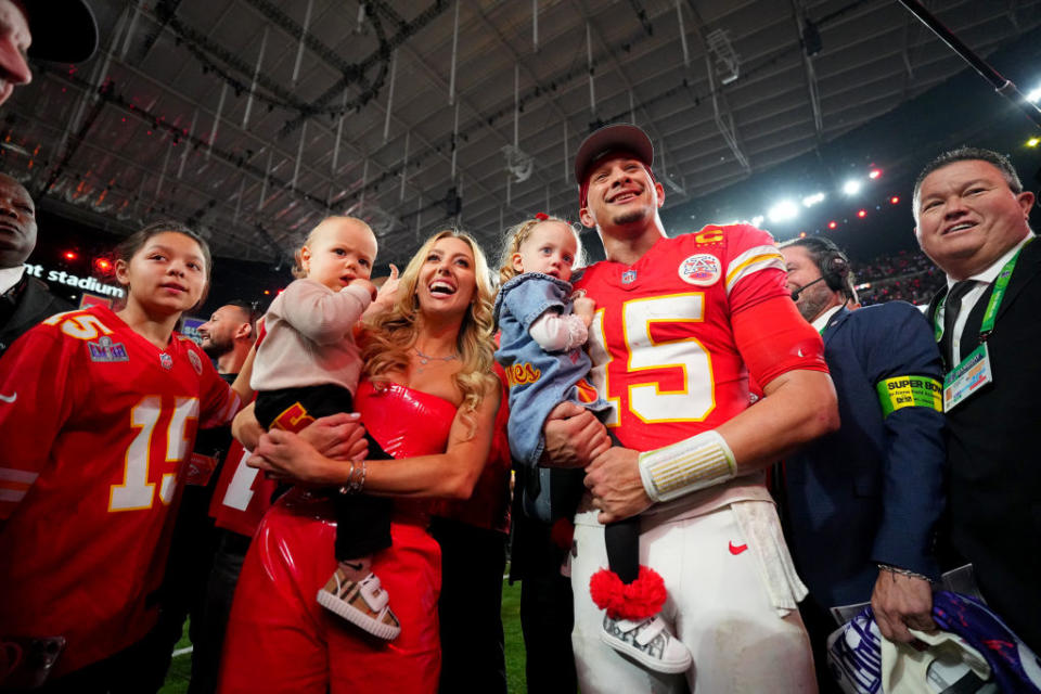 Football: Super Bowl LVIII: Kansas City Chiefs Patrick Mahomes (15) poses with wife Brittany Mahomes and their children Patrick Bronze and Sterling Skye following victory vs San Francisco 49ers at Allegiant Stadium. 
Las Vegas, NV 2/11/2024
CREDIT: Erick W. Rasco (Photo by Erick W. Rasco/Sports Illustrated via Getty Images) 
(Set Number: X164496 TK1)