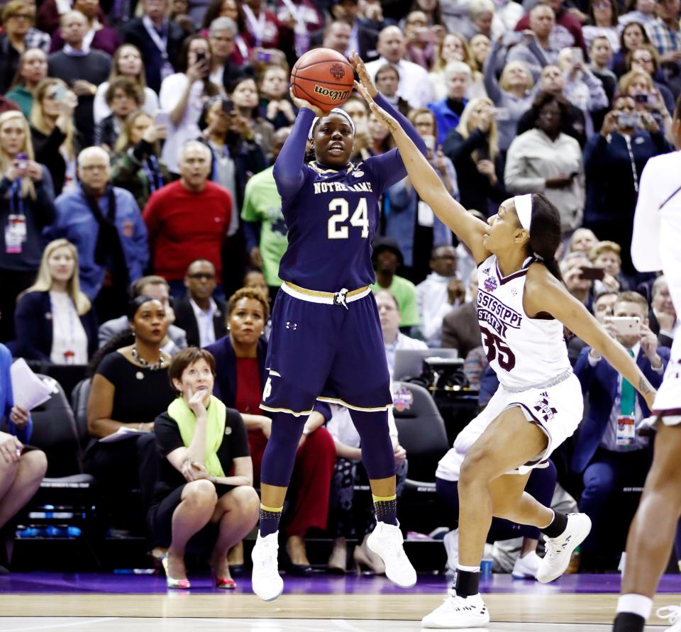 One of the biggest shots in college basketball history came from someone wearing long sleeves.