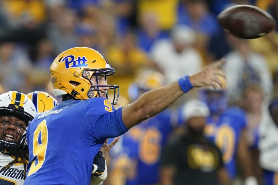 Pittsburgh quarterback Kedon Slovis throws the ball.