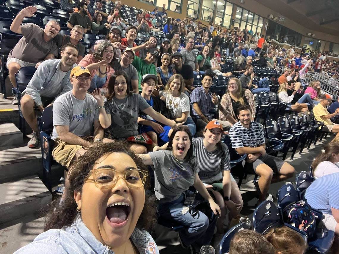 The News & Observer staff cheers on the Durham Bulls on Thursday, September 22, 2022 at Durham Bulls Athletic Park.