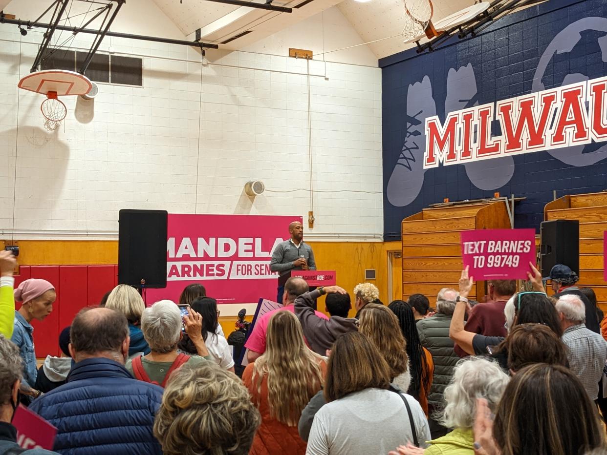 Barnes speaks at the rally at John Marshall High School in Milwaukee.