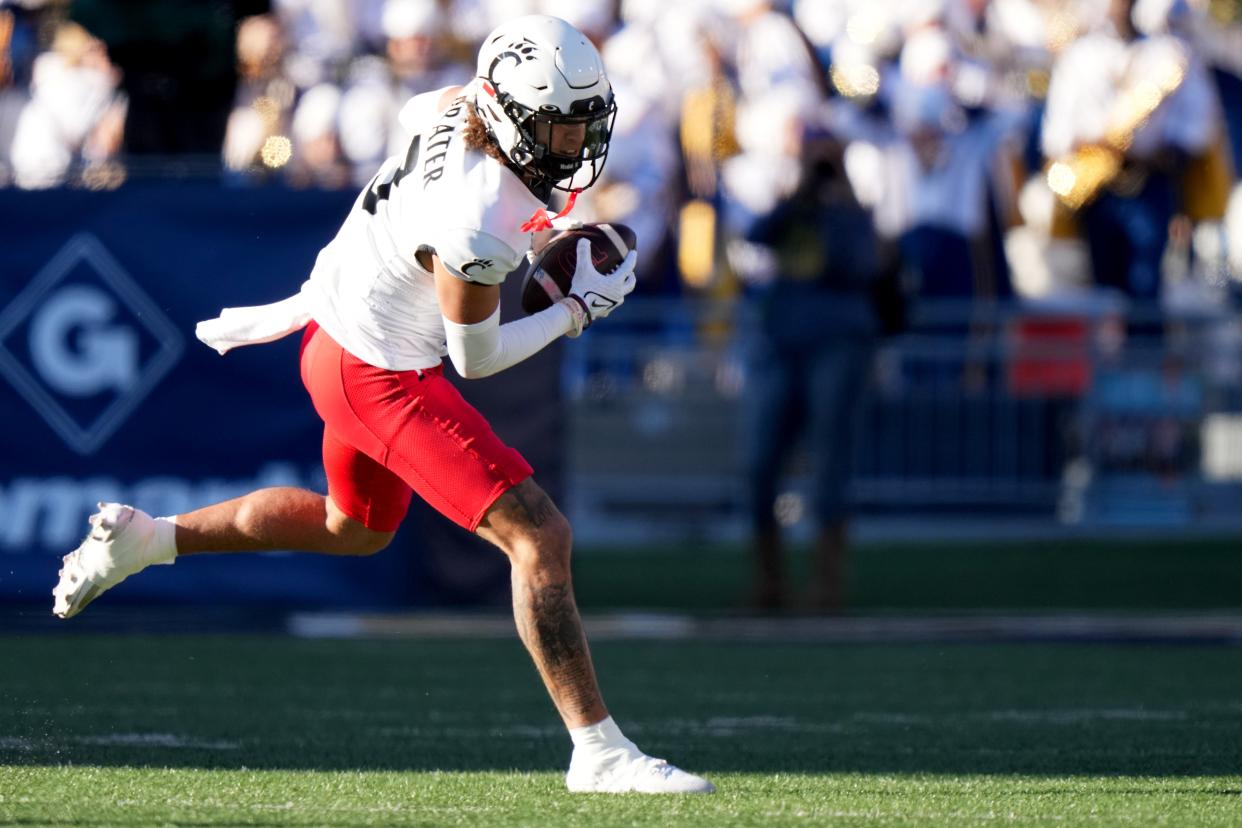 Cincinnati Bearcats wide receiver Evan Prater (3) catches a pass in the first quarter during an NCAA college football game between the Cincinnati Bearcats and the West Virginia Mountaineers, Saturday, Nov. 18. Prater will return to the Bearcats in 2024.