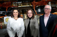 General Motors Chief Executive Mary Barra poses for a photograph with Michigan Governor Gretchen Whitmer and United Auto Workers union Vice President Terry Dittes at the GM Orion Assembly Plant in Lake Orion, Michigan, U.S. March 22, 2019. REUTERS/Rebecca Cook