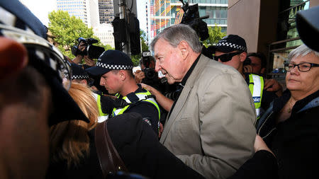 Cardinal George Pell departs the Melbourne Magistrates Court in Melbourne, Australia, March 5, 2018. AAP/James Ross/via REUTERS