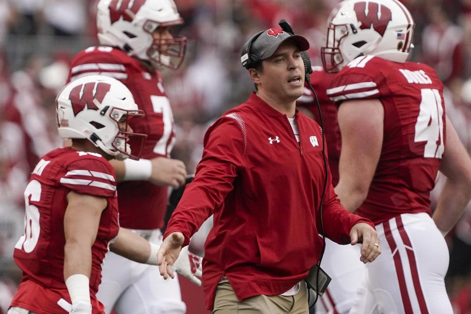 Wisconsin defensive coordinator Jim Leonhard reacts to a stop during the first half of an NCAA college football game against Penn State Saturday, Sept. 4, 2021, in Madison, Wis. (AP Photo/Morry Gash)