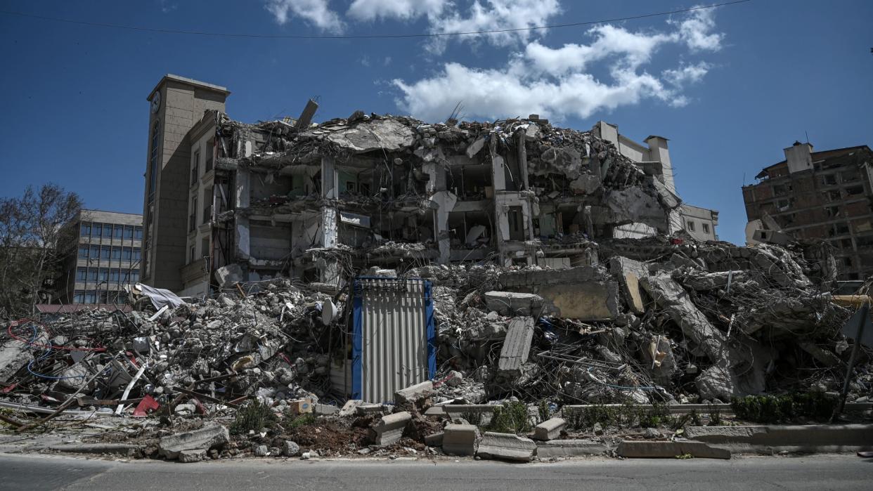  A crumbled building in the wake of an earthquake 