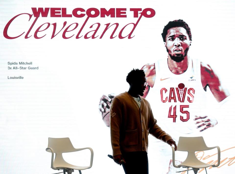 Cleveland Cavaliers guard Donovan Mitchell takes his seat at the start of his introductory press conference at Rocket Mortgage FieldHouse, Wednesday, Sept. 14, 2022, in Cleveland, Ohio.