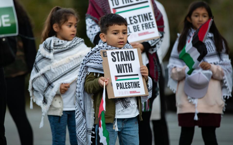 A couple hundred people gathered in a parking lot across from Cascades Park to show support for Palestine and protest aid being sent to Israel on Wednesday, Oct. 18, 2023.